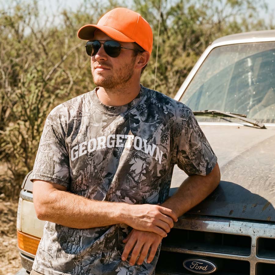 Lifestyle photo of model wearing Georgetown camo graphic tee oversized heavyweight cotton shirt Texas apparel