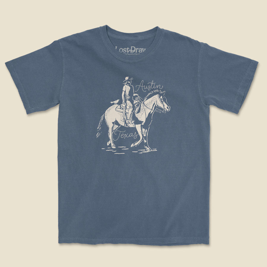 Dust and Reins Austin denim t-shirt with rugged western graphic flat lay