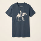 Front of the Dust & Reins Jersey Tee in Vintage Navy featuring a cream-colored cowgirl riding a horse illustration.