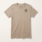Front of the Tan Face the Storm Jersey Tee featuring a small Lost Draw Provisions buffalo emblem on the left chest.