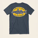 Back of the Vintage Navy On the Water Tee featuring a distressed yellow fishing badge and Good Days Start on the Water lettering.