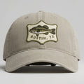 Beige cap with fish emblem and 'Austin, TX' text on a gray background