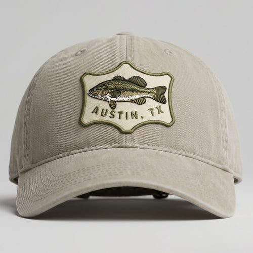 Beige cap with fish emblem and 'Austin, TX' text on a gray background