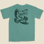 Flay lay back of Soaring hawk Texas graphic printed on light green t-shirt by Lost Draw Provisions