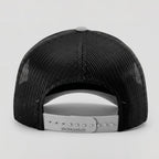 Black mesh cap with Richardson logo on a light gray background