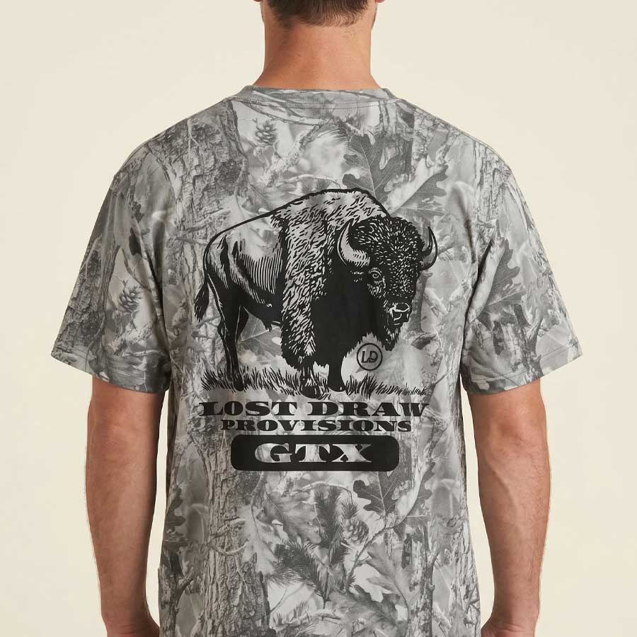 Back of model wearing Texas wildlife bison graphic tee oversized drop shoulder camo shirt
