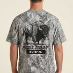 Back of model wearing Texas wildlife bison graphic tee oversized drop shoulder camo shirt