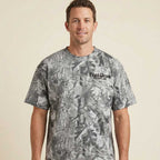 Front of model wearing Western bison t-shirt vintage camo oversized heavyweight cotton tee