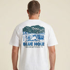 Back view of man wearing a white Blue Hole Georgetown Texas graphic tee oversized white heavyweight t-shirt Lost Draw Provisions