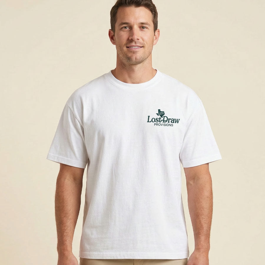 front view of man wearing a white Blue Hole Georgetown Texas graphic tee oversized white heavyweight t-shirt Lost Draw Provisions
