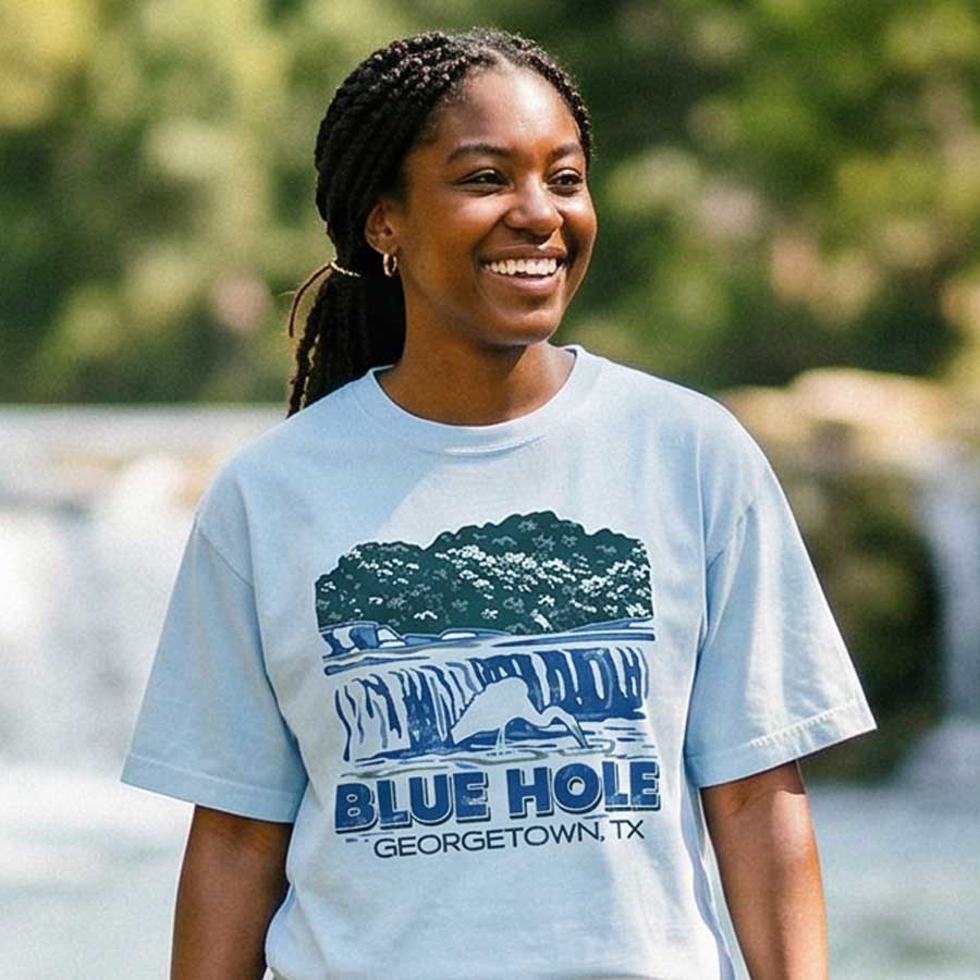 Woman wearing Blue Hole Park Georgetown TX graphic tee women’s cropped boxy fit shirt