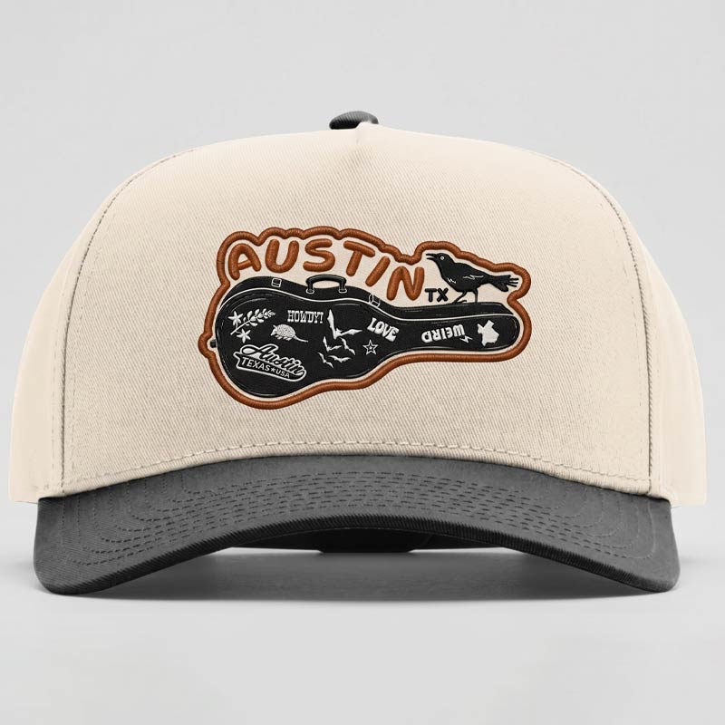 Beige and gray cap with 'Austin, TX' logo on a light gray background