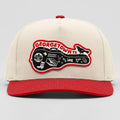 Beige cap with red brim and Georgetown TX patch on a light gray background