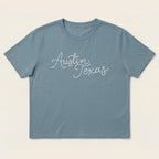 Flay lay front view of Chainstitch Austin women’s heavyweight t-shirt
