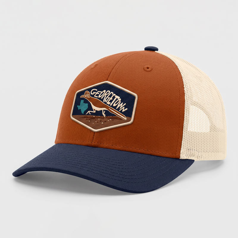 Brown and navy cap with a Georgetown patch on a light gray background