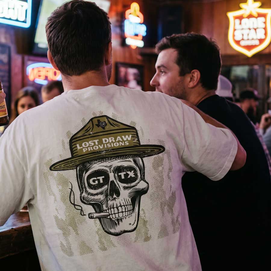 Lifestyle image of heavyweight oversized Georgetown Texas t-shirt skull graphic western style tee