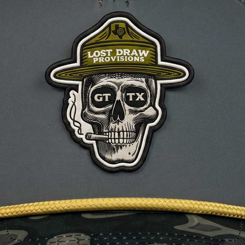 Patch with skull design and 'Lost Draw Provisions' text on a gray background