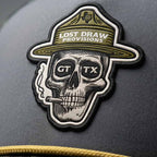 Patch with skull design and 'Lost Draw Provisions' text on a dark background
