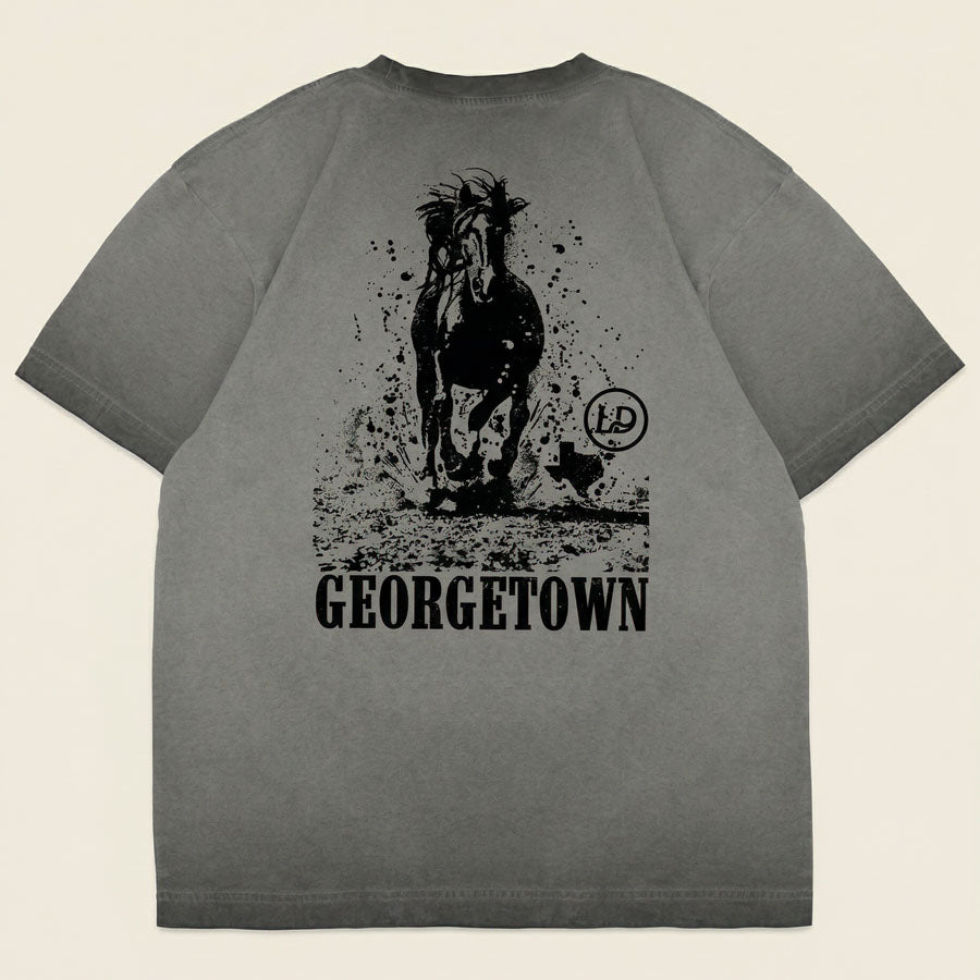 GTX Stampede Georgetown Texas graphic tee oversized charcoal heavyweight t-shirt Lost Draw Provisions flat lay back