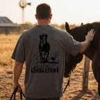 Man standing with a horse in a field, wearing Western style horse t-shirt charcoal oversized heavyweight cotton tee
