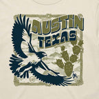 Close-up of Hawk & Thorn graphic featuring hawk and desert cactus design