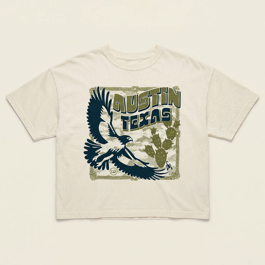 Front view of Hawk & Thorn women’s graphic t-shirt on vintage white tee