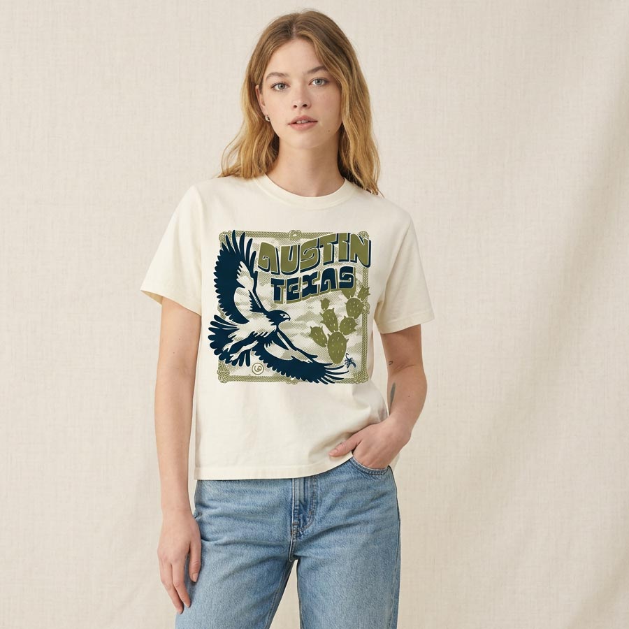 model wearing relaxed fit boxy tee with hawk design