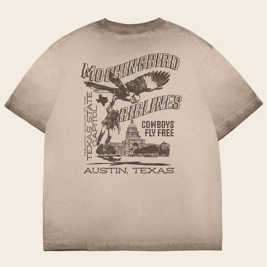 Back of Mockingbird Express Austin Texas oversized heavyweight T-shirt featuring vintage travel-inspired screen print