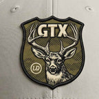 Patch details of Putty and olive Lost Draw Provisions performance hat with UV printed embroidered-look GTX deer crest patch on Imperial performance cap.
