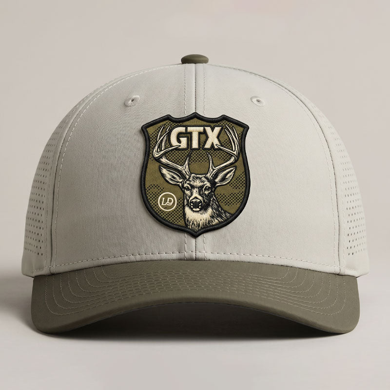 Putty and olive Lost Draw Provisions performance hat with UV printed embroidered-look GTX deer crest patch on Imperial performance cap.