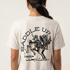 Back studio view of the Vintage White Saddle Up Jersey Tee featuring the cowboy riding a bucking jackalope.