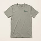Lost Hawk Jersey Tee in Thyme green featuring a small forest-green Lost Draw Provisions hawk logo on the left chest.