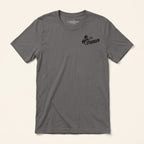 Front of the Too Stubborn Jersey Tee in Asphalt featuring a small black rearing horse and Stubborn graphic on the left chest.
